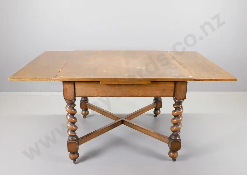 oak Jacobean style drawer leaf table and four chairs, table having twist legs on X-frame stretcher base Image 1++