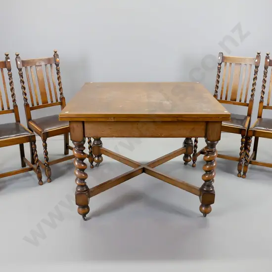 oak Jacobean style drawer leaf table and four chairs, table having twist legs on X-frame stretcher base