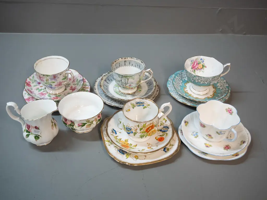English china teaware - 4 Royal Albert trios, cream & sugar, and a Shelley trio Image 1++