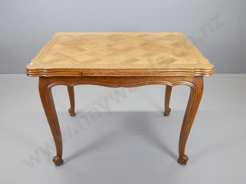 French oak draw leaf table with parquetry inlay top and tapered scrolling legs, H-740, W- 1000, D- 750 Image 1++