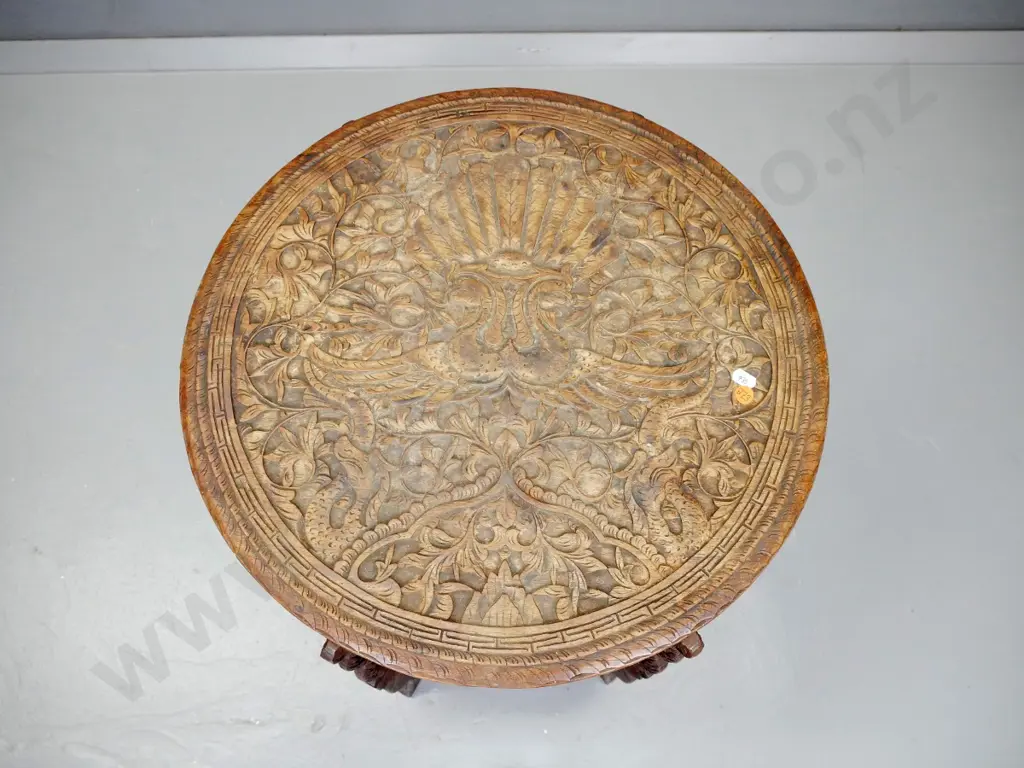 Indian hardwood heavily carved 6-legged occasional table with bird and foliage decoration - worn finish on top, chips to Image 1++