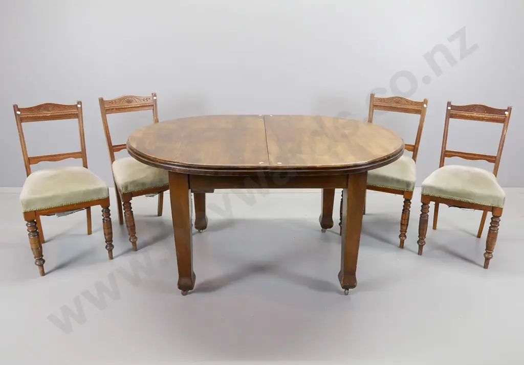 vintage oval oak extending table with four beech turned leg, green upholstered dining chairs Image 1++