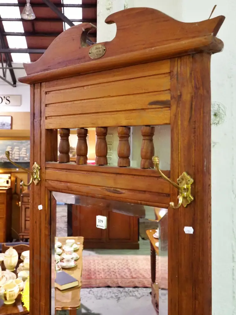 reproduction hall stand with bevelled edge mirror, 2 brass coat hooks, 1 drawer, 1 door w/ wooden knobs Image 1++