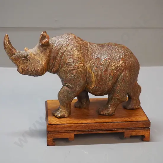 heavy carved stone rhinoceros figure on wooden stand H-170 L-240