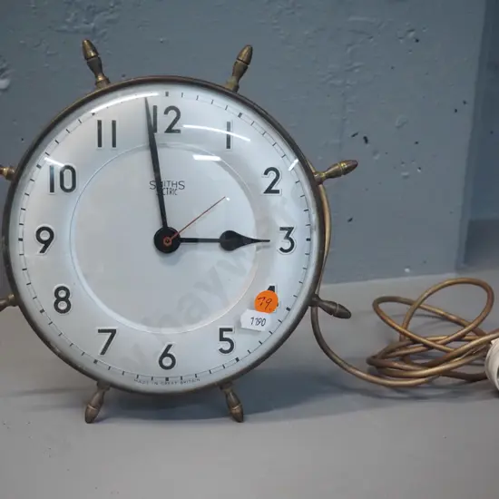 vintage brass cased Smiths electric mantel/wall clock in shape of ship's wheel D-230