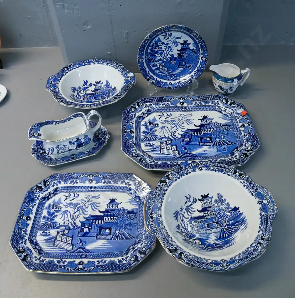 Burleigh "Willow" pattern items - 2 ashetts, 2 serving bowls, gravy boat & saucer and an odd blue & white creamer Image 1++
