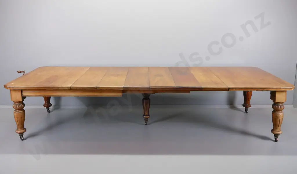 large jacobean style oak and walnut dining table, with crank handle, and harlequin set of ten high back chairs. Image 1++