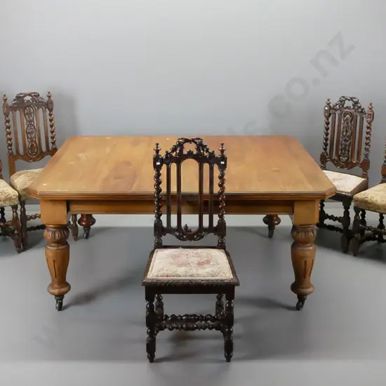 large jacobean style oak and walnut dining table, with crank handle, and harlequin set of ten high back chairs.