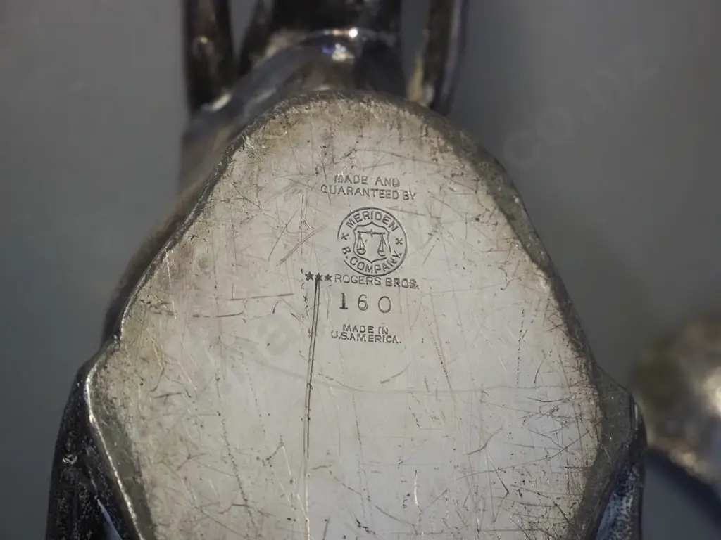 silver plated Indian style elephant head inkwell with monkey playing flute on lid, marked Meriden USA, damage to hinge, Image 1++