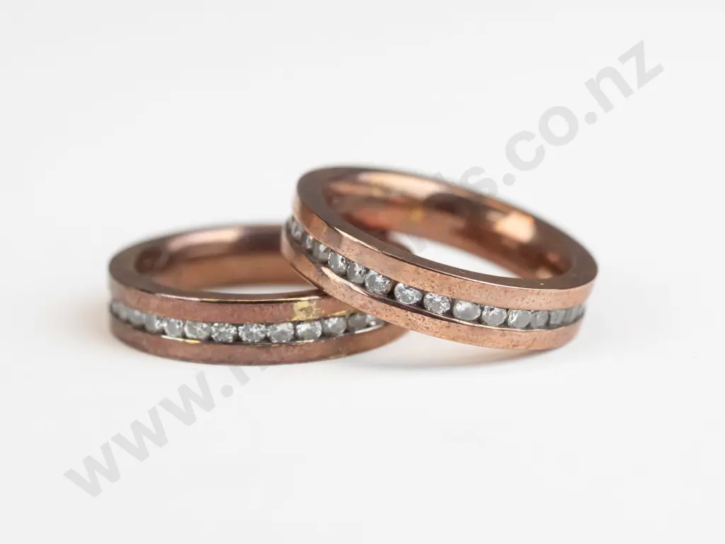 2 stainless steel rings stamped 'Spikes stainless steel' Image 1++
