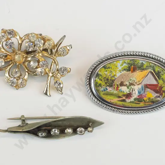 3 costume brooches