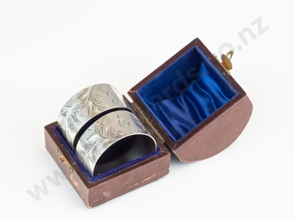 pair of silver napkin rings boxed stamped sterling Image 1++