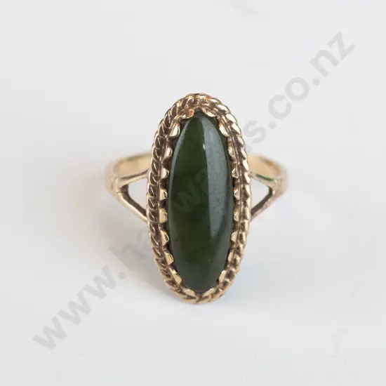 green stone ring stamped 9ct