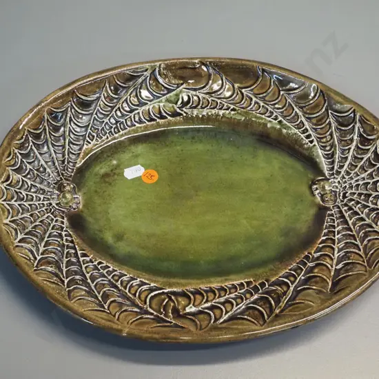 studio pottery oval platter with raised spider & web decoration L-340 W-270 - no maker's mark