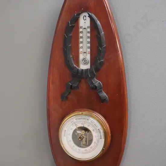 Veranderlyn wood-cased wall-barometer / thermometer H-460 W-200