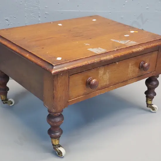 antique low timber single drawer cabinet on porcelain casters, has mounting holes on top - music cabinet base?