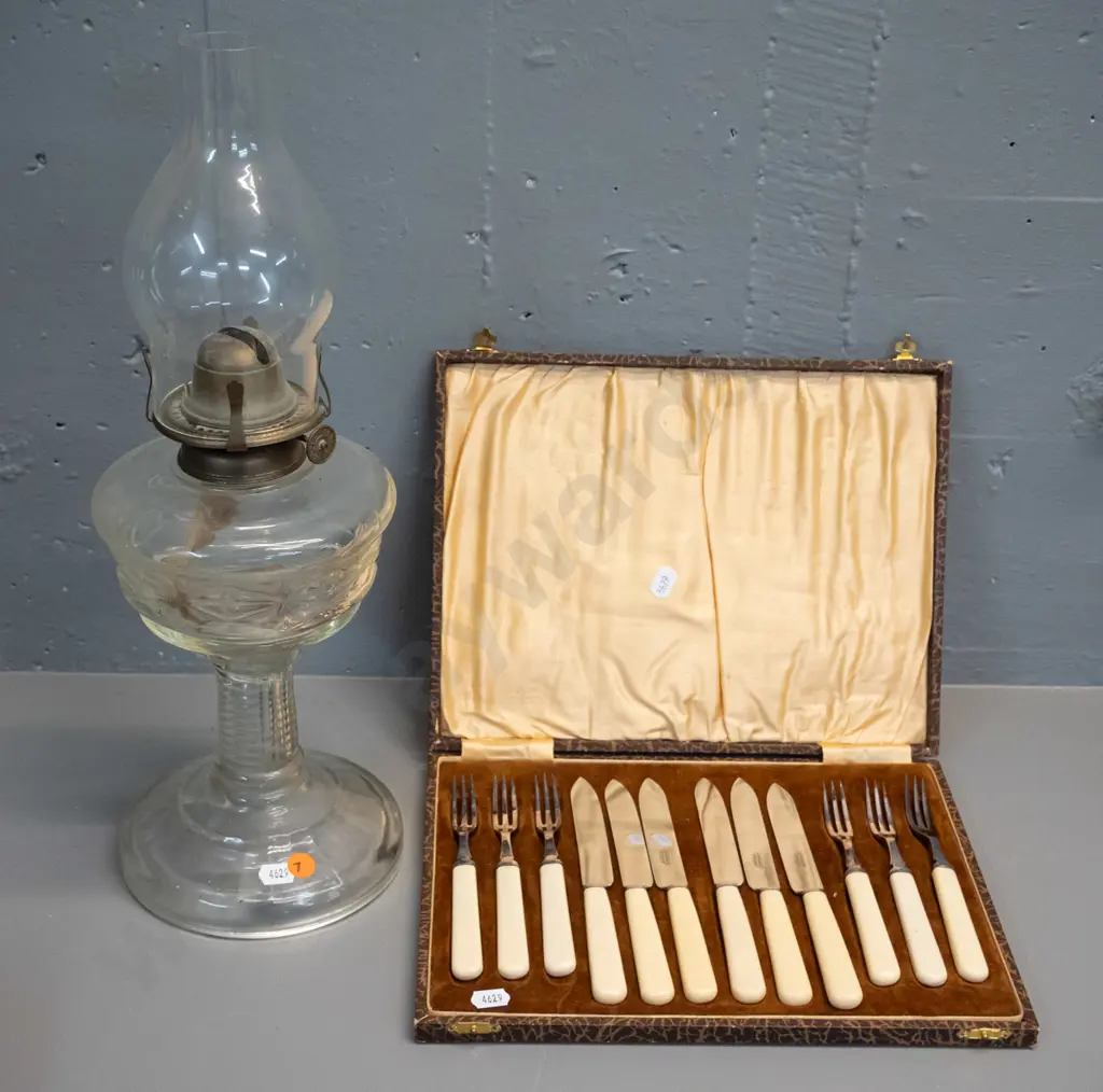clear glass kerosene lamp H-420 and a cased set of bone-handled dessert knives and forks Image 1++