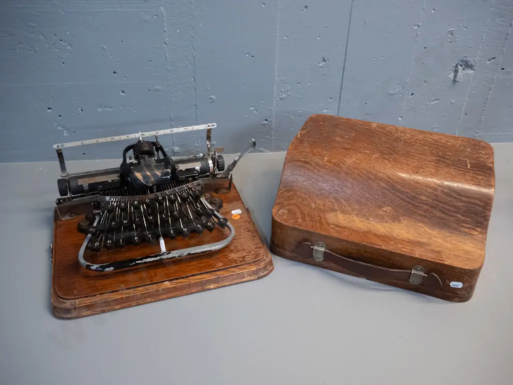 vintage oak-cased portable typewriter - Blickensderfer / New Sealand Typewriter Co. - general wear and tear Image 1++