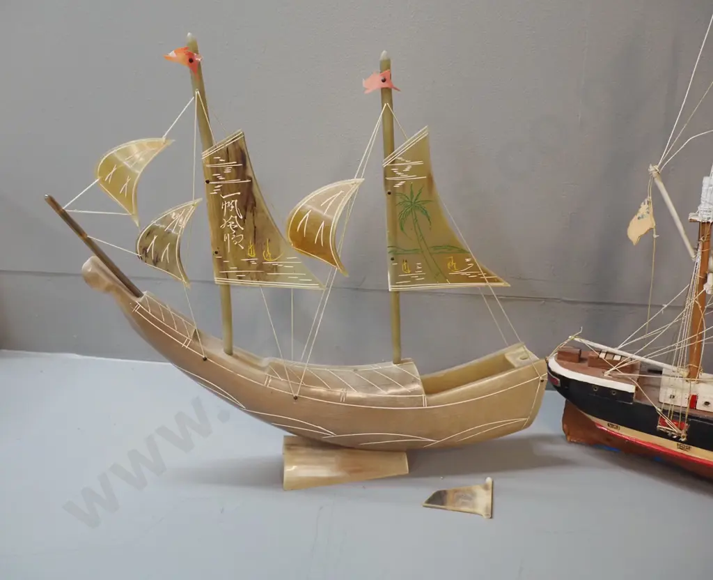 3 model ships - one horn and two timber, all with either minor damage or marking, rudder for horn ship is Image 1++