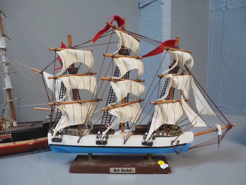 3 model ships - one horn and two timber, all with either minor damage or marking, rudder for horn ship is Image 1++