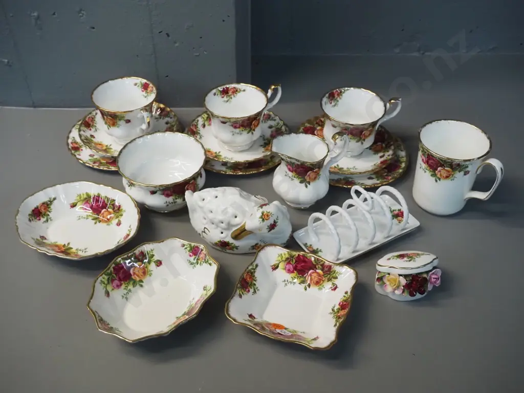 assorted Royal Albert Old English Rose teaware, toast rack, hat pin holder, sweet dishes etc. Image 1++