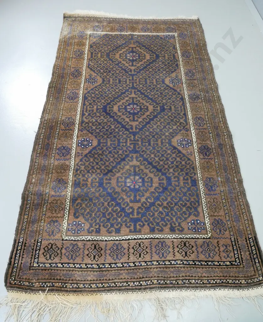 hand-knotted tribal wool floor rug - dark blue and brown, fading, esp. to one end L-2100 W-1200 Image 1++