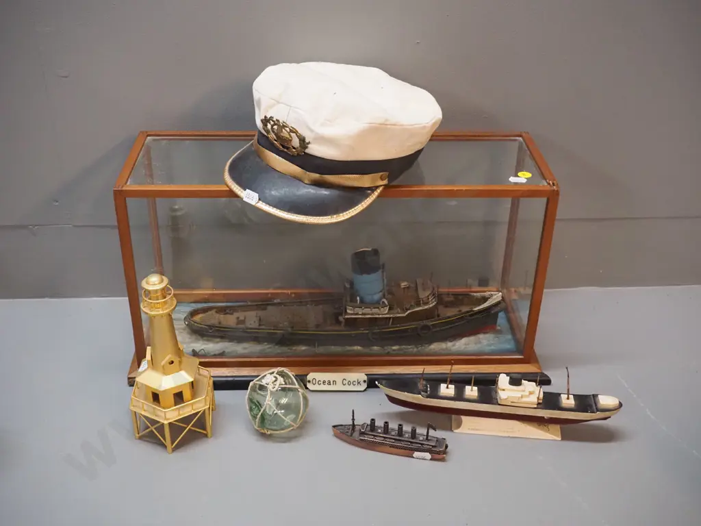 "Ocean Cock" steamer / tugboat in timber and glass case, a captain's hat, small glass float, modern brass lighthouse, Image 1++