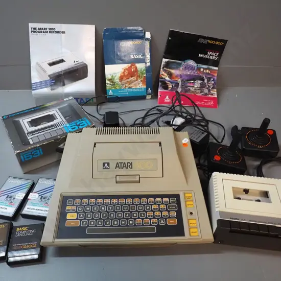 Atari 400 computer / game console with 2 joysticks, Atari 1010 data cassette, 2 tapes and 2 cartridges,