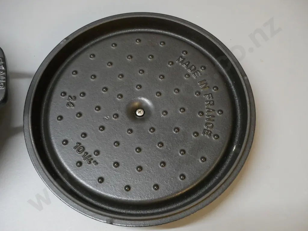 Staub "La Cocotte" made in France heavy cast iron 10.25 inch lidded casserole with brass handle H140 W-330 at handles Image 1++