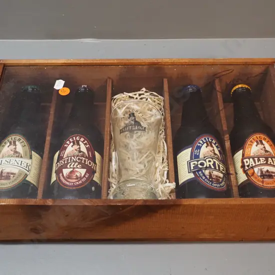 wood-cased set of 4 Speights special edition beers with perspex top signed by Tony Brown, dated 26/4/2004, with news