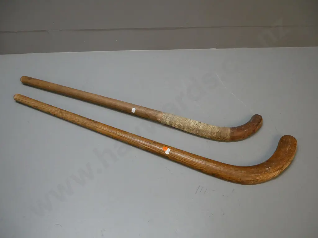 2 vintage field hockey sticks - one marked "The National" and intiials AKH L-920, some wear, other has cord binding Image 1++