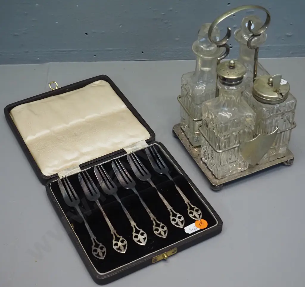 cased set of 6 sterling silver cake forks and a plated and glass 4-piece condiment set and stand with prize dedication Image 1++