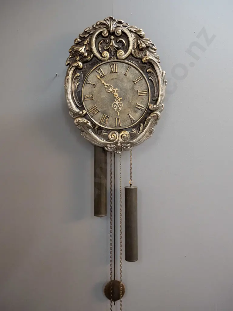 "Atlanta" West German ornate wall clock with cast metal face H-400 W-300 Image 1++
