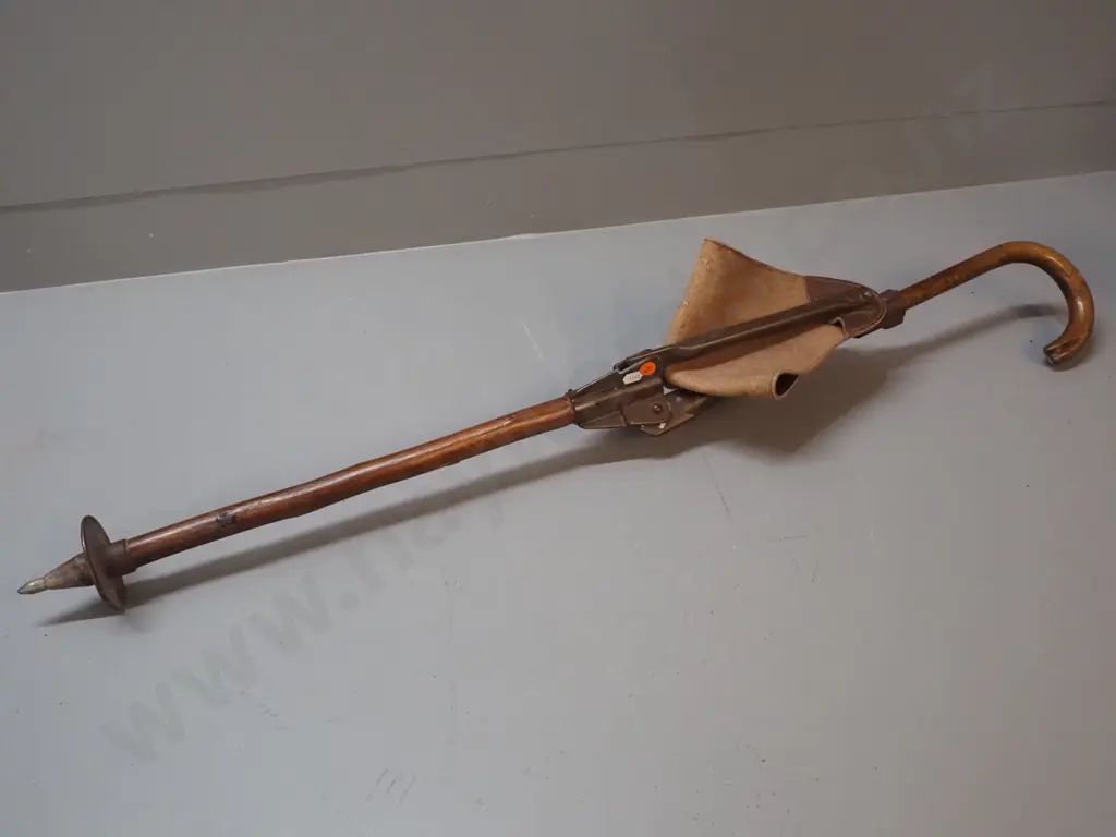 AKAH cane/seat - timber with leather triangular seat, metal and plastic fittings L-950 Image 1++