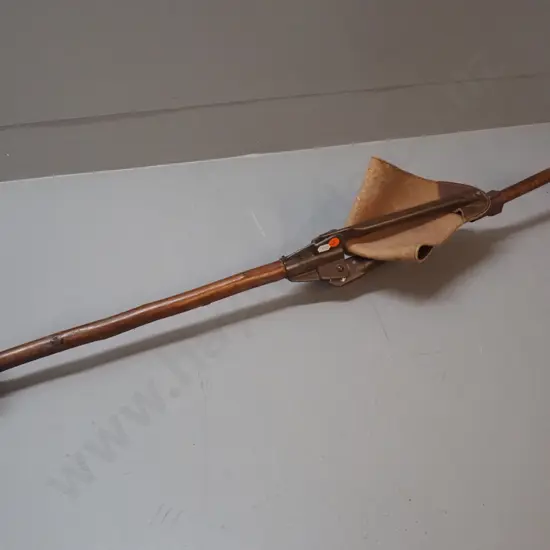 AKAH cane/seat - timber with leather triangular seat, metal and plastic fittings L-950