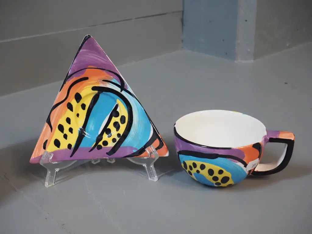 2 NZ studio pottery items - Barry & Diane Woods Golden Bay vase H-210 and a hand-painted cup & saucer Image 1++