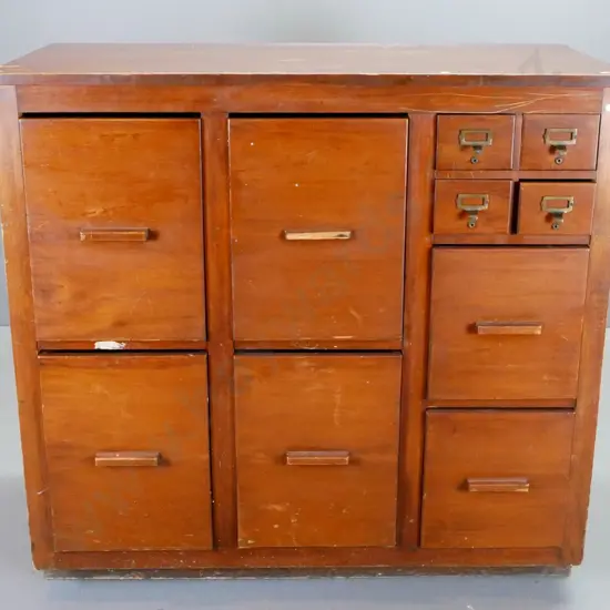 vintage kauri drawer unit with 4 large, 2 medium drawers and 4 small library card file drawers. Chips and damage, part