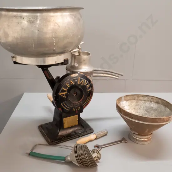 vintage Alfa Laval No. 2 milk separator - marked made in Sweden - with funnel and accessories. Some paint loss and dents