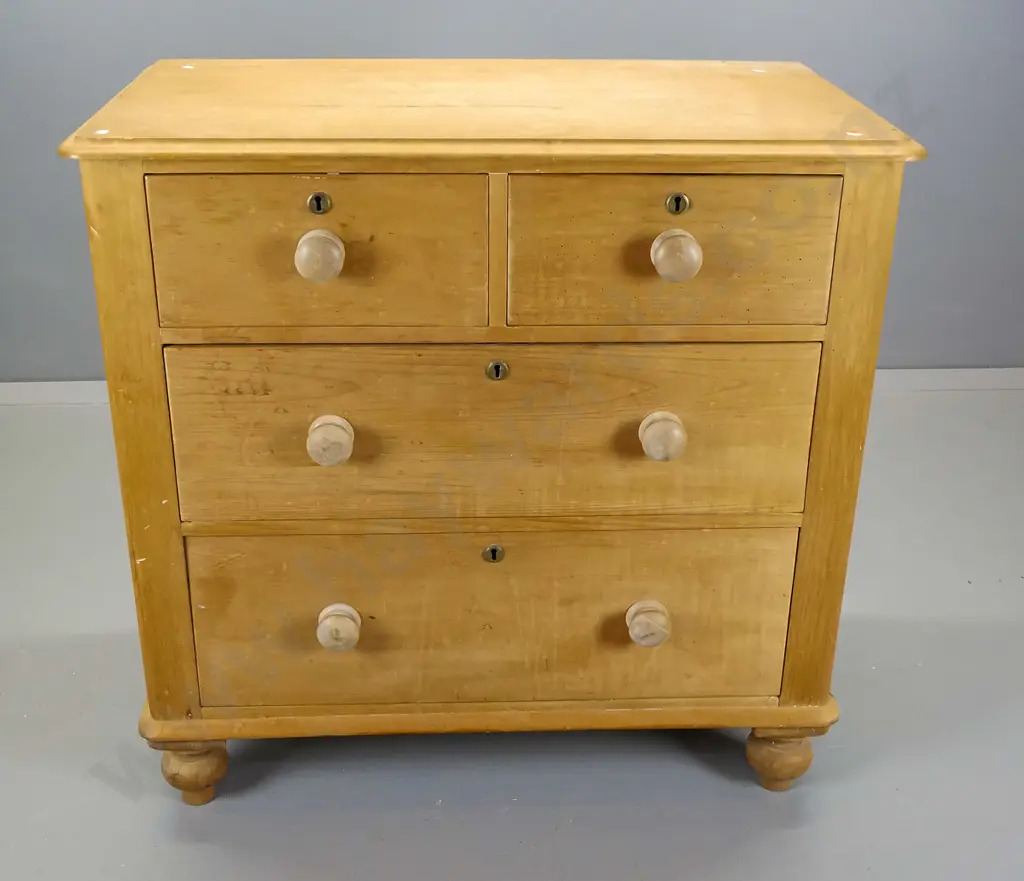 colonial kauri four drawer chest round cornered having brass escutcheons, wooden knobs, some borer Image 1++