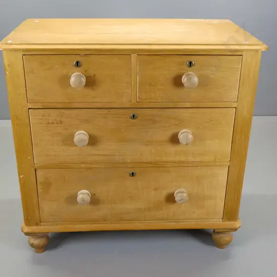 colonial kauri four drawer chest round cornered having brass escutcheons, wooden knobs, some borer