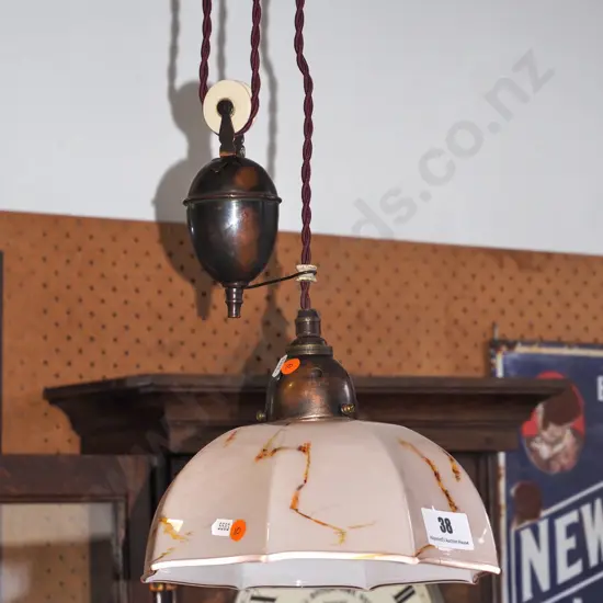 rise and fall hanging light with pink fluted shade and mottled decoration