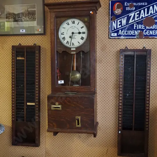 Gledhill-Brook time recorder in oak, having two side card holders, original condition, some borer