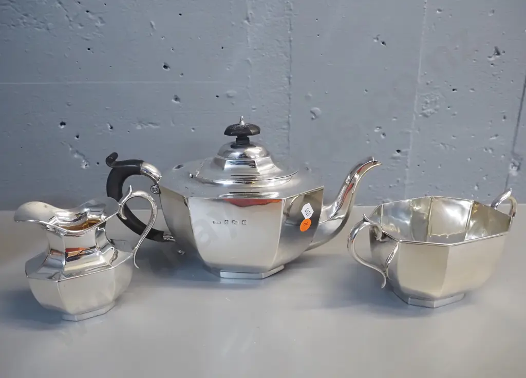 sterling silver deco style teapot, creamer jug and sugar bowl with bakelite handles. Teapot H-170 W-280 Image 1++