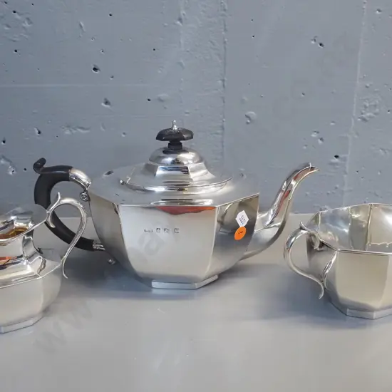 sterling silver deco style teapot, creamer jug and sugar bowl with bakelite handles. Teapot H-170 W-280