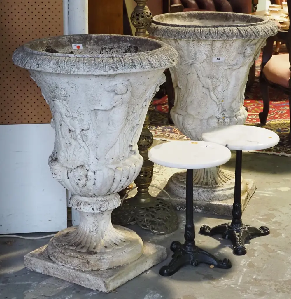 pair of classical style concrete garden urns on fluted base with cavorting maidens in relief H-830 Diam-580 Image 1++