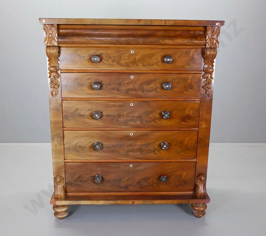 full sized mahogany chest of drawers having flame mahogany drawer fronts with ebonised knobs Image 1++