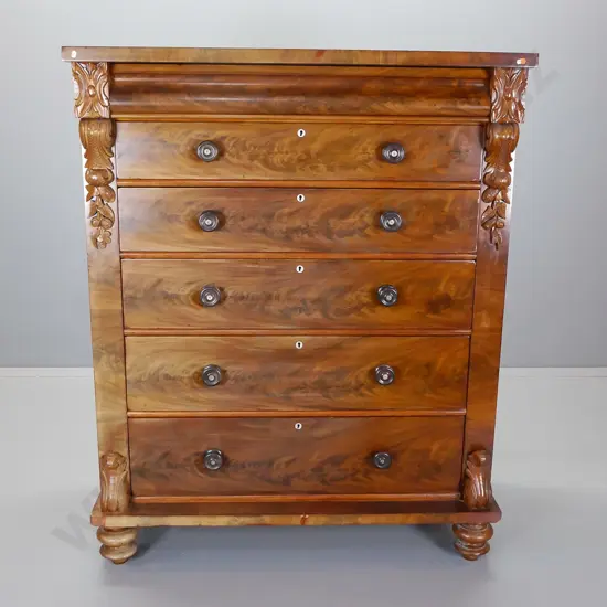 full sized mahogany chest of drawers having flame mahogany drawer fronts with ebonised knobs
