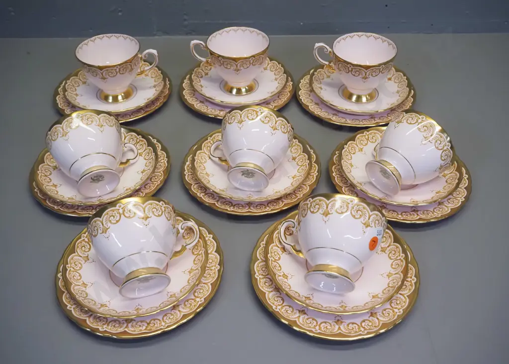 set of 8 Tuscan bone china pink glaze gilt pattern trios Image 1++