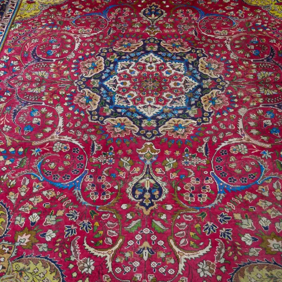 large carpet square, foliate and floral in reds blues and yellows, some wear, 3980x2950