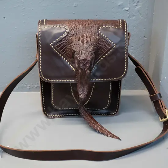 as-new leather and crocodile skin shoulder bag with crocodile head and tail, brass catch and buckle H300 W220 D80